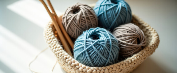 Fototapeta premium Balls of yarn in a basket