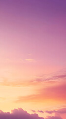 Fototapeta premium A soft autumn sunset background with pastel oranges and purples blending into a clear evening sky