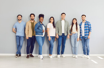 Portrait of a diverse group of young people, students, coworkers, staff, or friends, stands...
