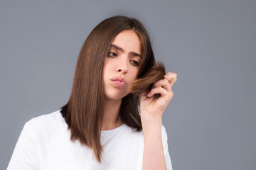 Obraz premium Woman loosing hair. Hair loss problem, baldness.