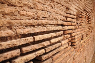 Ancient Roman brickwork with detailed historic architecture