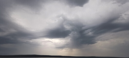 storm clouds in the sky, ominous dark stormy skies