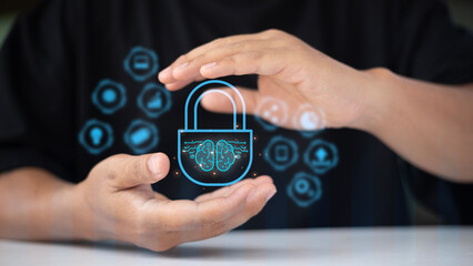 A person is holding a blue lock with a brain on it