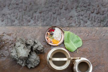 Offerings for the gods on steps of the Ganges River