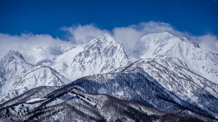 晴れた日の冬の北アルプス　山並み　長野県白馬村