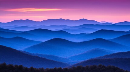 Obraz premium Gentle undulating mountain ranges bathed in soft purple and blue hues during twilight hours in a tranquil natural landscape