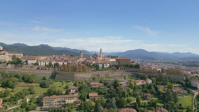 Aerial shot of the hill where Bergamo Alta lies in northern Italy near Orio al Serio Airport during a beautiful sunny day