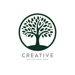 Obraz premium Creative artistic tree logo concept. eco friendly tree logo. Colorful leaf tree logo. minimalist tree vector icon logo