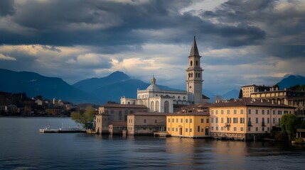 Naklejka premium Cathedral church, lake, clouds, tourism, architecture and mountains at a distance.