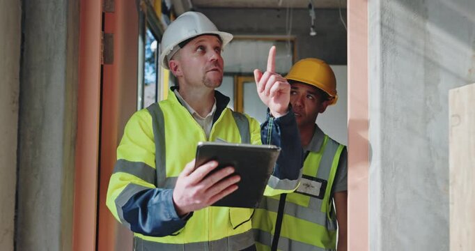 Collaboration, engineer and men with tablet, talking and inspection of property, planning and people in construction. Architecture, project and ideas for design, renovation or maintenance of building