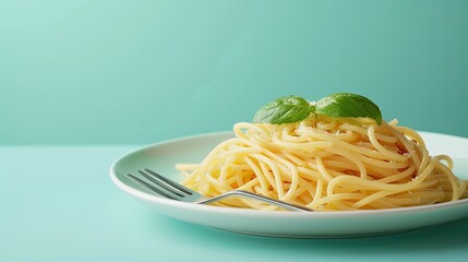 A plate of spaghetti with a fork. This photo is perfect for showcasing Italian cuisine or simple meals.