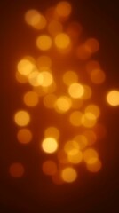 Festive bokeh lights in warm tones with a glowing effect. Ideal for holiday celebrations, festive backgrounds, or romantic settings