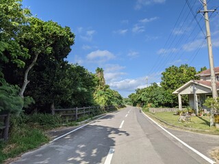 a road under the blue sky