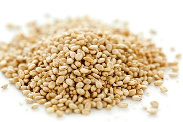 Fototapeta premium A close-up view of a pile of sesame seeds on a white surface
