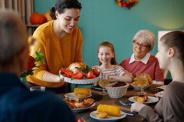 Family celebrating Thanksgiving Day