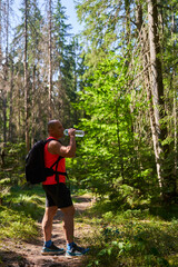 Hiker drinking water