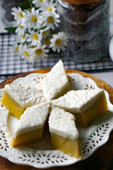 Kuih Talam Pisang, a steamed dessert made with banana and rice flour, featuring a soft, layered texture and sweet, creamy flavor.