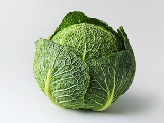 Fototapeta premium Vibrant green cabbage with detailed leaves, isolated on a clean white background, perfect for healthy food concepts.