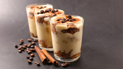 Tiramisu in Glasses with Spices and Coffee Beans – Delicious Italian Dessert