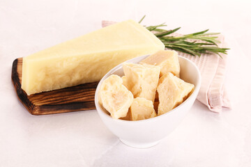 Chopped Italian hard parmesan cheese
