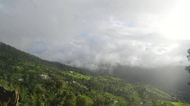 A Clouds Timelapse Shot at Devasthal,kutiya khal Village in Pauri Garhwal,Uttarakhand in India

