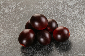 Raw ripe black kumato tomato