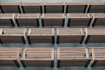 empty wooden classic park benches without people