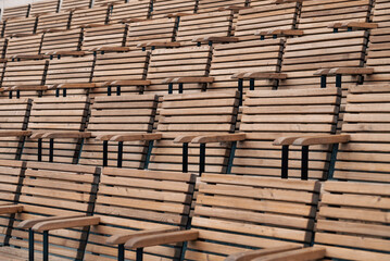 empty wooden classic park benches without people