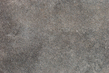 Dark gray textured cement wall background