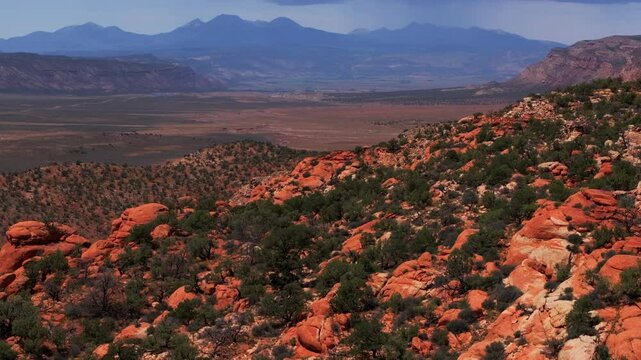 Colorado Utah Border aerial drone Moab Spanish Valley La Sal Mountain Rocky Mountains highway 90 road Telluride Montrose county summer dry Redvale Norwood rain thunderstorm clouds sunny forward pan