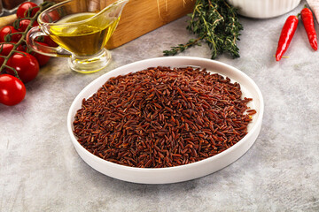 Red raw dry rice gor cooking