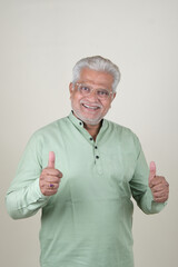 Confident Mature Man Smiling in Casual Attire, Embracing Life's Simplicity and Joy.