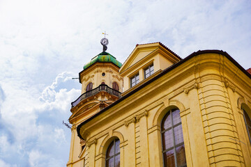Low angle view of a building against cloudy sky