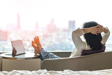 Simple lifestyle take it easy relaxation of Asian businesswoman, healthy woman resting in comfort...