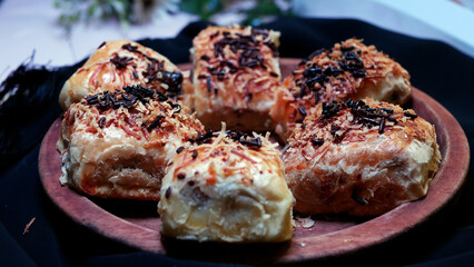 Bolen is a traditional cake or bread originating from Bandung, Indonesia. Bolen has a soft texture and is usually filled with various fillings such as banana, cheese, chocolate.