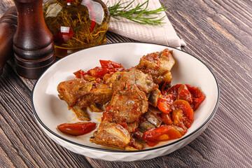 Baked lamb ribs with vegetables