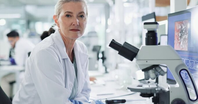 Mature woman, scientist and microscope in lab with face, pc and clinical analysis for bacteria. Person, study and research with virus, particles or molecules for vaccine development at pharma company