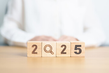2025 block with magnifying glass icon. SEO, Search Engine Optimization, hiring , Advertising, Idea,...