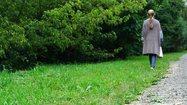 Senior woman walks relaxing outdoor