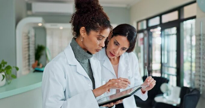 Tablet, glasses and women optometrists in store for prescription lenses for vision, medical or health. Optometry, digital technology and team of eye care specialists with spectacles in optical shop.