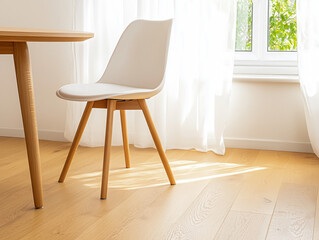 Fototapeta premium Minimalist dining room interior with round table and soft chairs