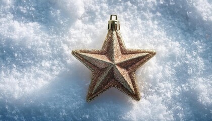 Golden Glitter Star Ornament Resting on Soft, Sparkling Snow. Winter New Year Holiday Decor Symbolizing Festive Christmas Spirit and Seasonal Cheer