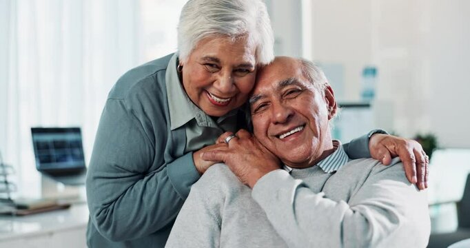 Senior, couple and happy with hug in clinic for healthcare support, consultation and comfort for rehabilitation. Elderly, people and portrait in hospital for medical checkup, caregiver and empathy