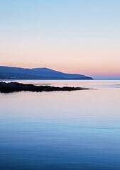 Peaceful Sea Under Pastel Sky at Sunset