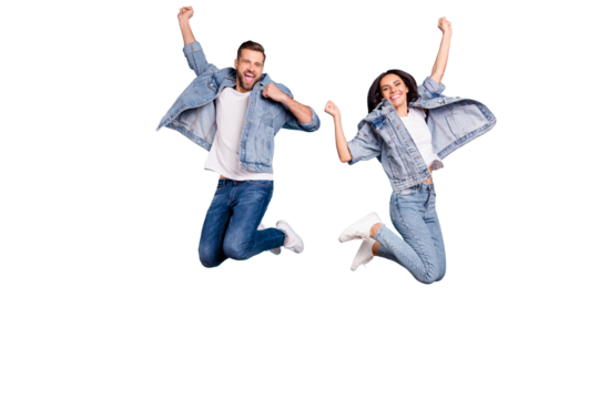 Photo of overjoyed joyful cute nice couple of spouses jumping flying in air happily while isolated with blue background
