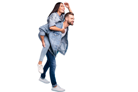 Full size profile side photo of cheerful people staring wearing denim jeans jackets isolated over blue background
