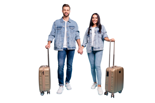 Full length photo of charming married couple having packages wearing denim jeans jackets isolated over blue background
