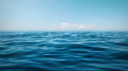 Tranquil Ocean Surface with Blue Sky and Clouds