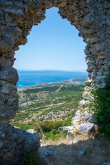 Novi Vinodolski as seen from vidikovac Gradina, through a ruins of an old settlement