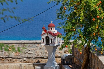 small orthodox chapel  on garden with sea view in Afytos on the Kassandra-Chalkidiki peninsula - Greece